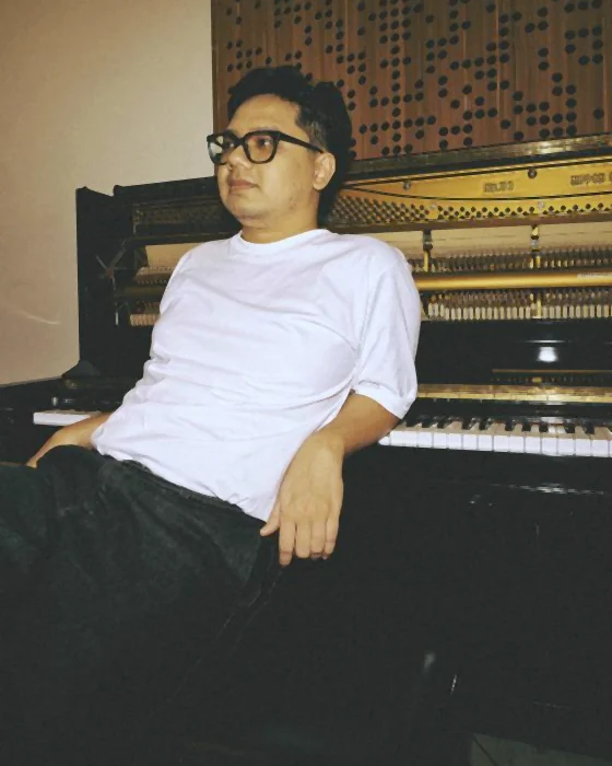 Otta Tarrega at an upright piano